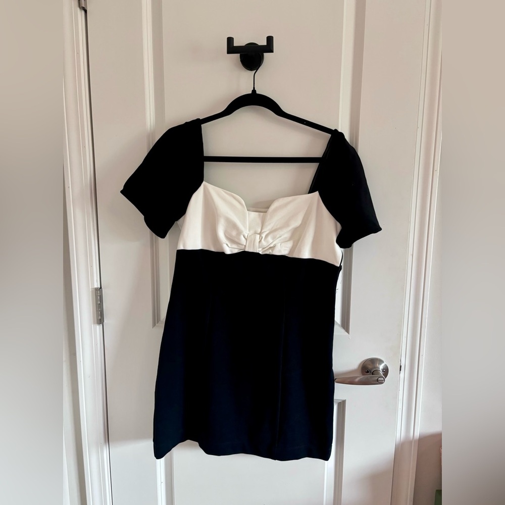 Mauve by anthropology. form fitting mini dresses with white bow accent